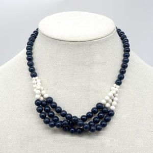 Necklace with Navy blue and white beads.